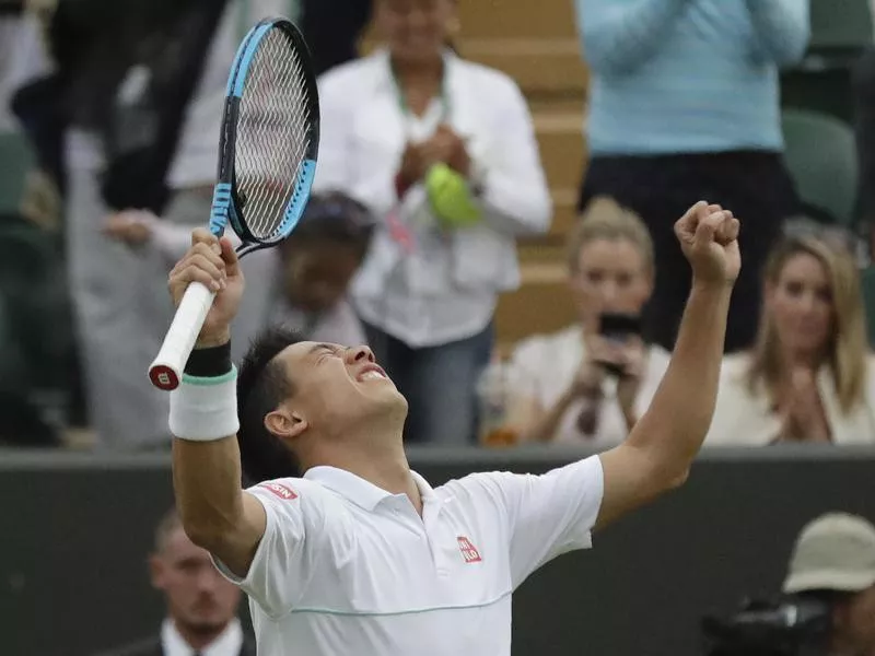 Japan's Kei Nishikori celebrates