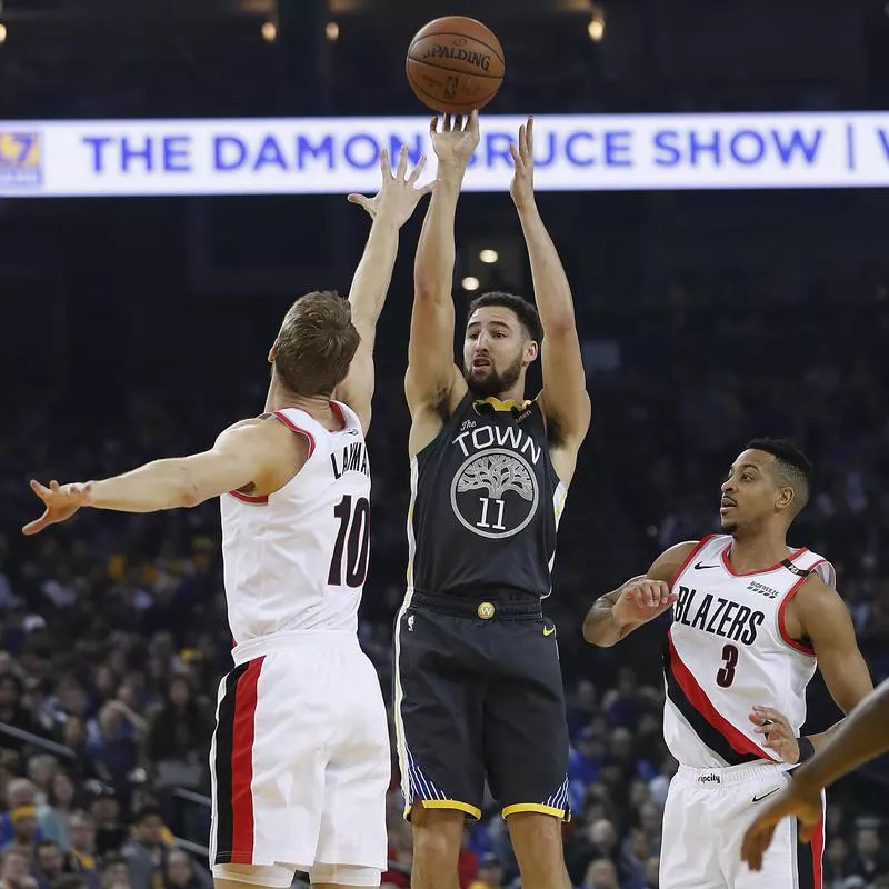 Klay Thompson takes 3-point shot over Portland Trail Blazers