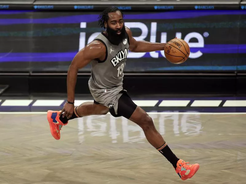 Brooklyn Nets guard James Harden drives to basket