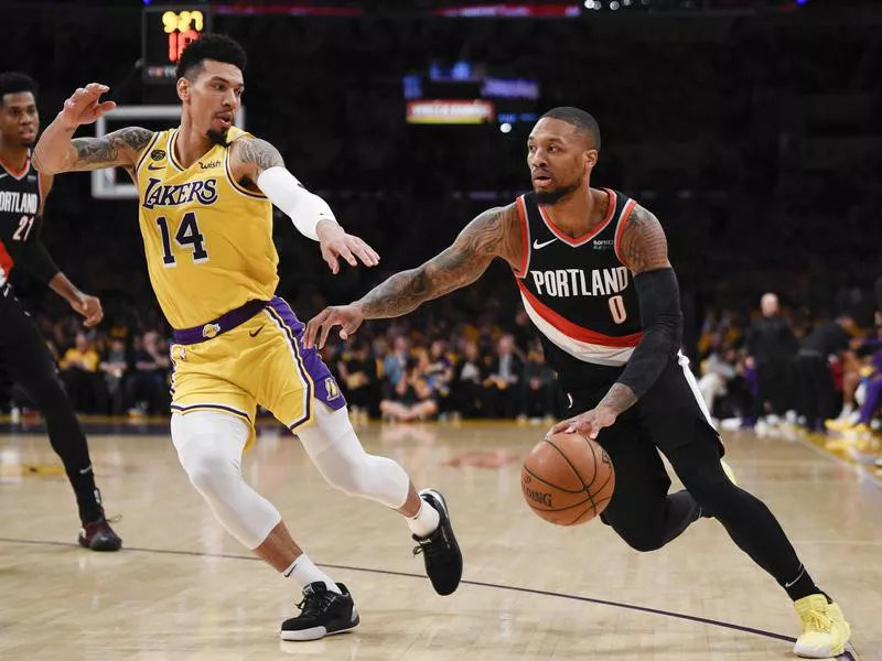 Portland Trail Blazers guard Damian Lillard drives to basket
