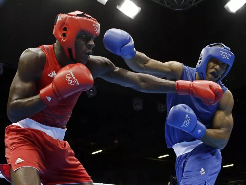 Britain's Anthony Joshua fights against Erislandy Savon Cotilla