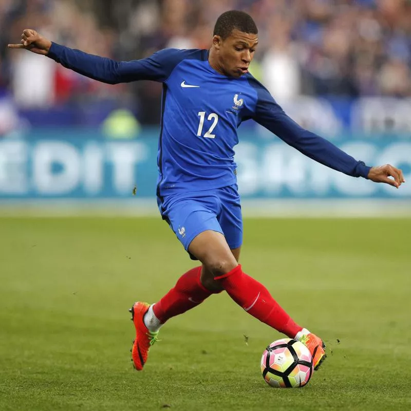 France's Kylian Mbappe controls ball