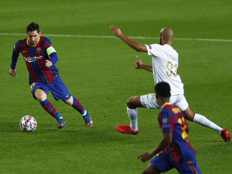 Barcelona's Lionel Messi controls the ball